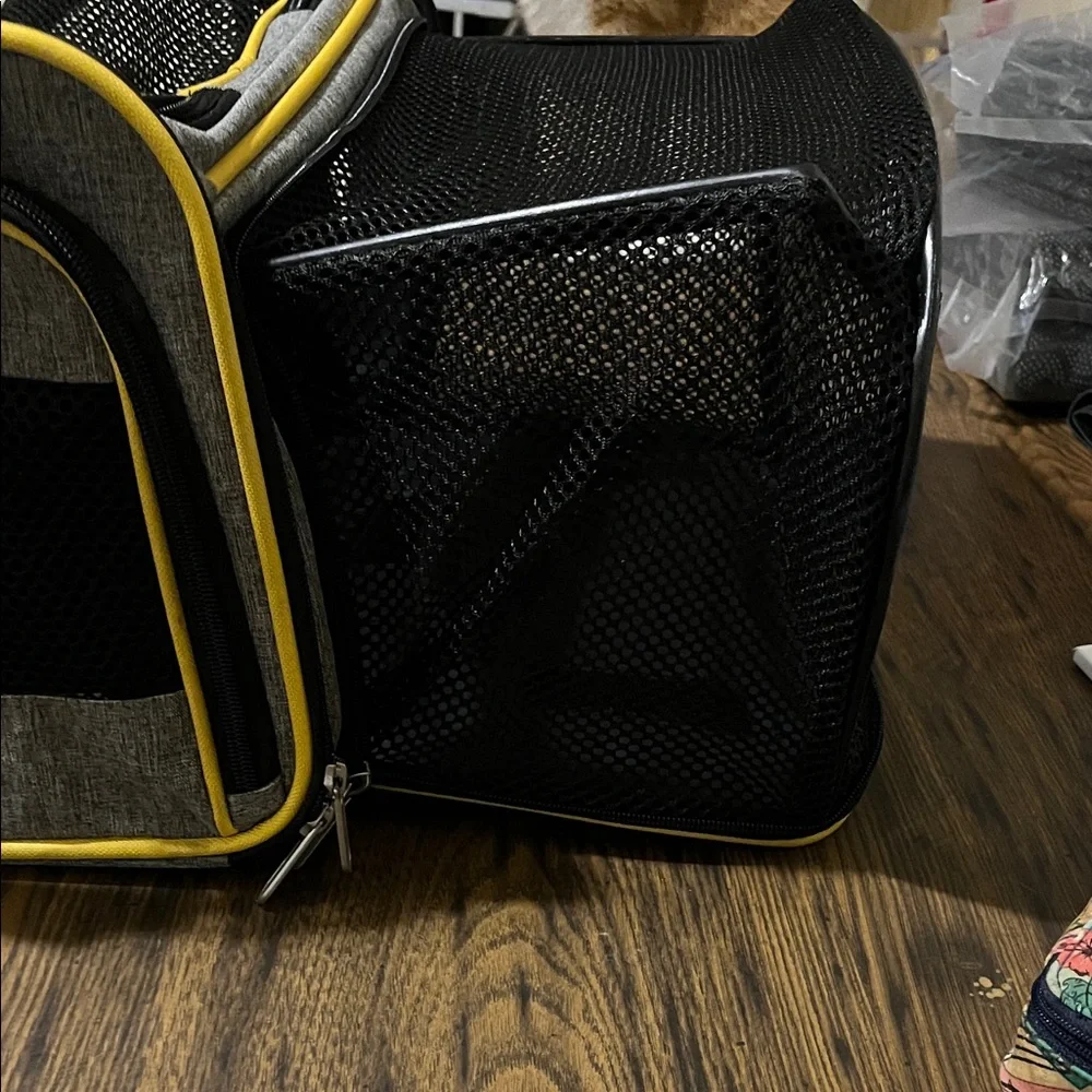 Gray and Yellow pet carrier